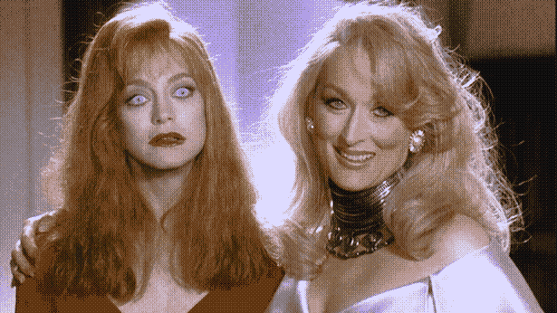 Meryl Streep and Goldie Hawn face the camera, backlit in an incredibly 1993 way