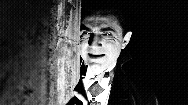 Black-and-white still of Bela Lugosi peeking around a corner making a goofy Dracula face. He is lit like he's telling a spooky campfire story