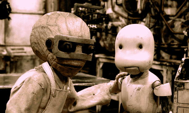 Stop-motion still of a weird alien-looking bald guy and a white, bulbous robot guy (he isn't really a robot, but, watch the movie.)