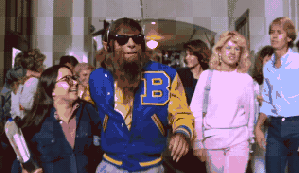 the Teen Wolf himself walks down a crowded hallway looking cool