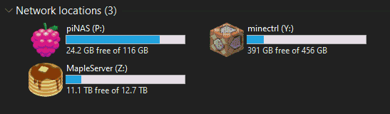 Screenshot of the network drives attached to my laptop. My previously-written-about Raspberry Pi NAS is listed, as is my 12TB server
